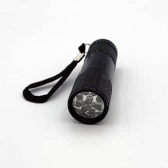 Linterna LED de mano con luz verde de la marca SPIDERLUX