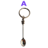 Cuchara para esnifar plateada con llavero incorporado.