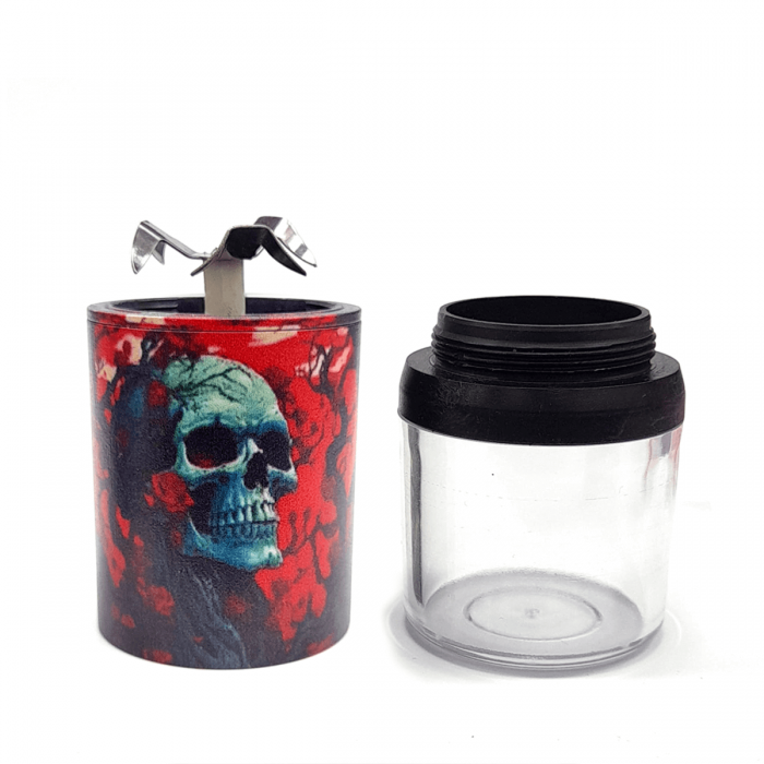 Grinder Eléctrico de plástico modelo calaveras con USB y batería desmontado.