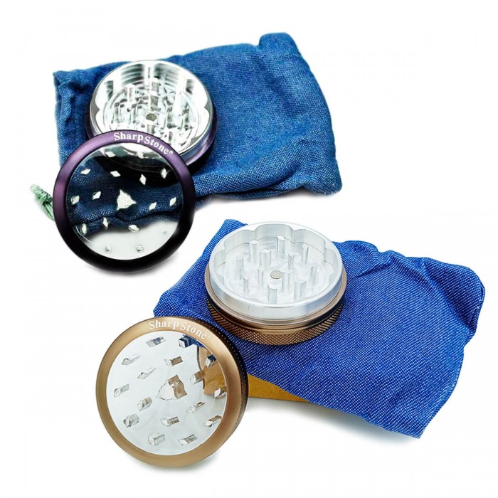 Grinder para marihuana hecho de metal y con tapa transparente y funda, diferentes colores.